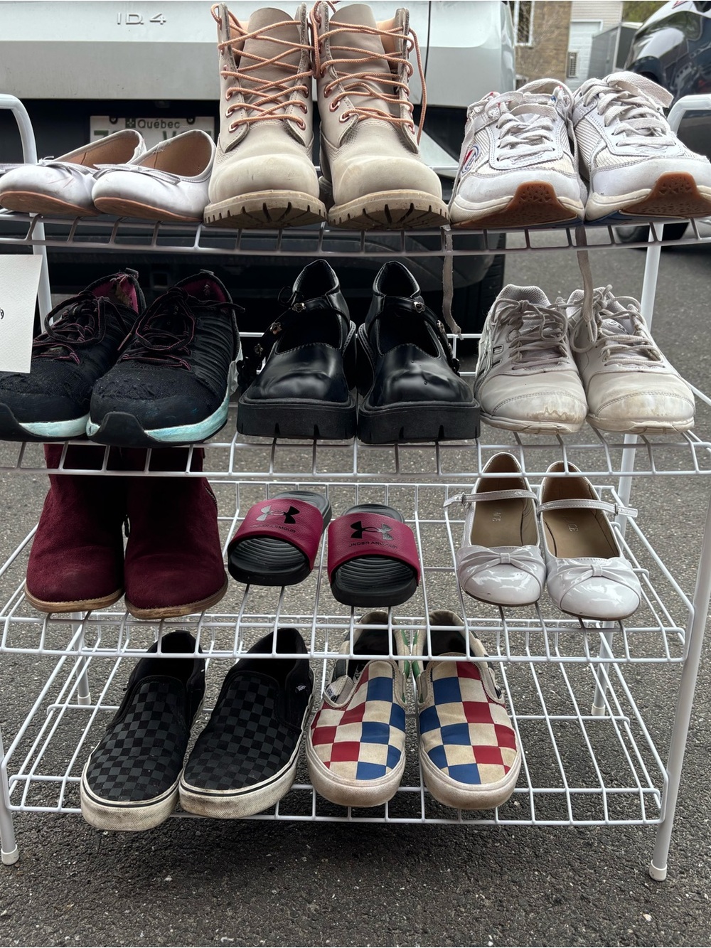 Different pairs of shoes and boots. Prices varie. The more you take, the cheaper